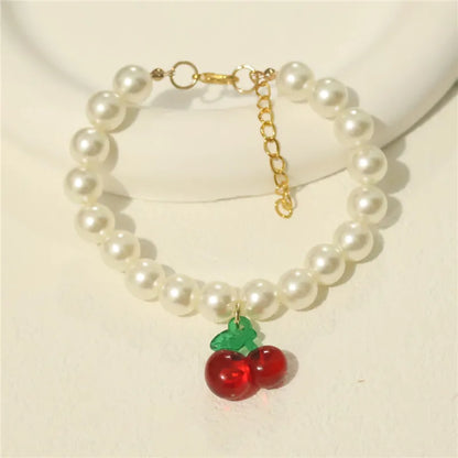 Collar de perlas para mascotas: hecho a mano, diseño de cereza para perros y gatos.