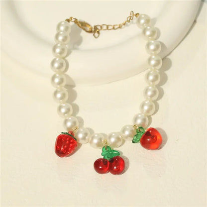 Collar de perlas para mascotas: hecho a mano, diseño de cereza para perros y gatos.